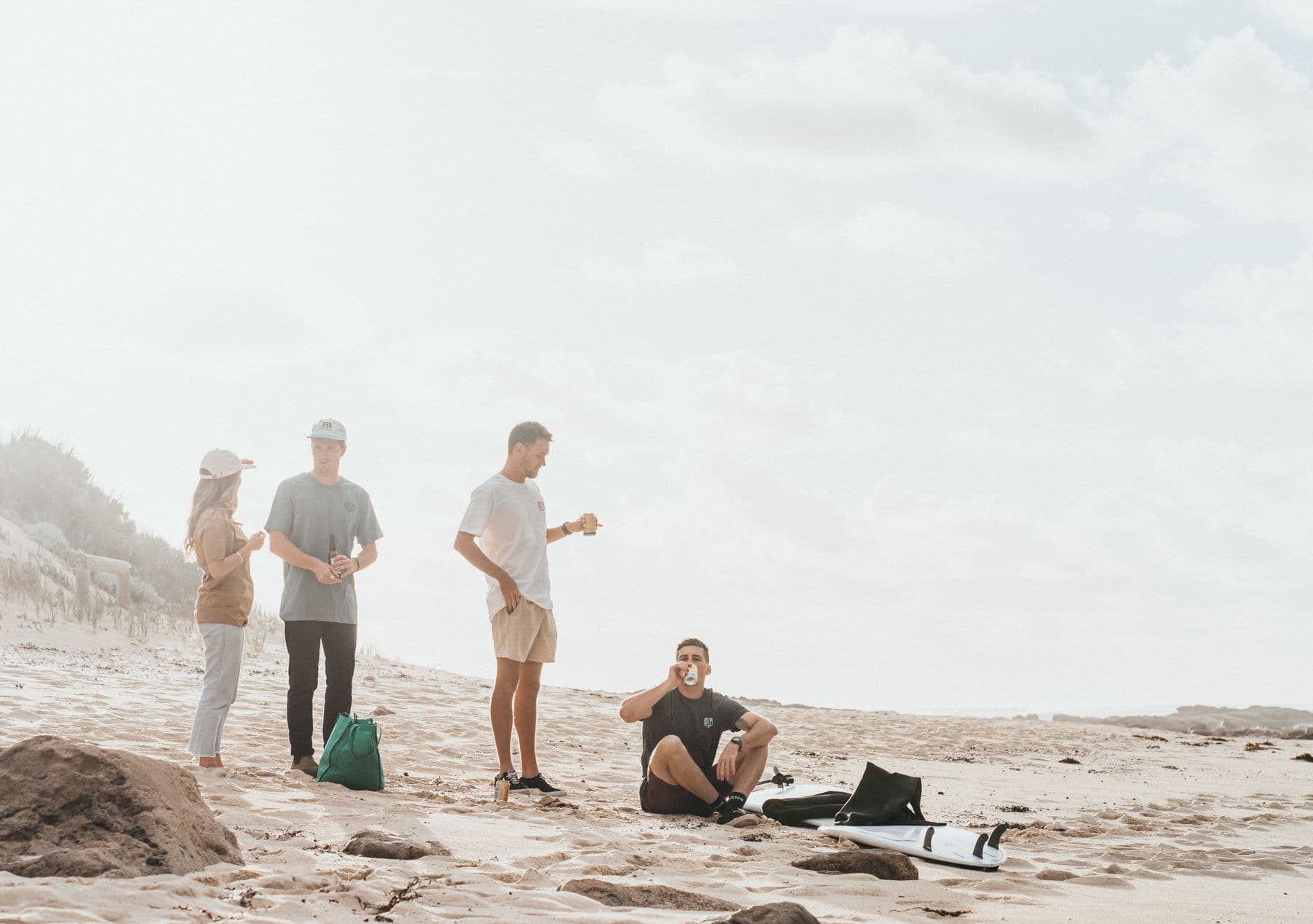 Friends relaxing together on a beach